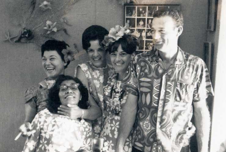 Ella Mahagan playfully holds Lola (a friend from Samoa) with Rosemary, Ella Mae, and Hylton (Sonny) to her right. This picture was taken during a celebration at Jean and Flip's house.