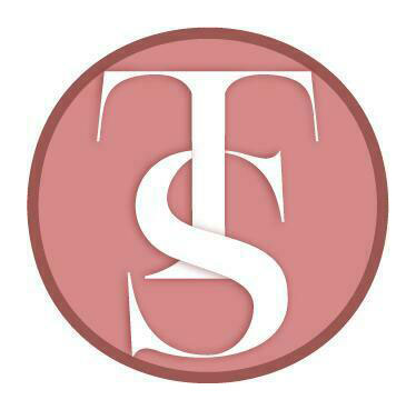 The letters T and S, with the S wrapping around the stem of the T
